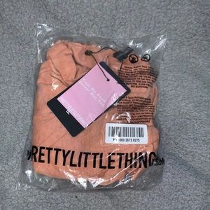 Pretty little things basic oversized shirt Size M.